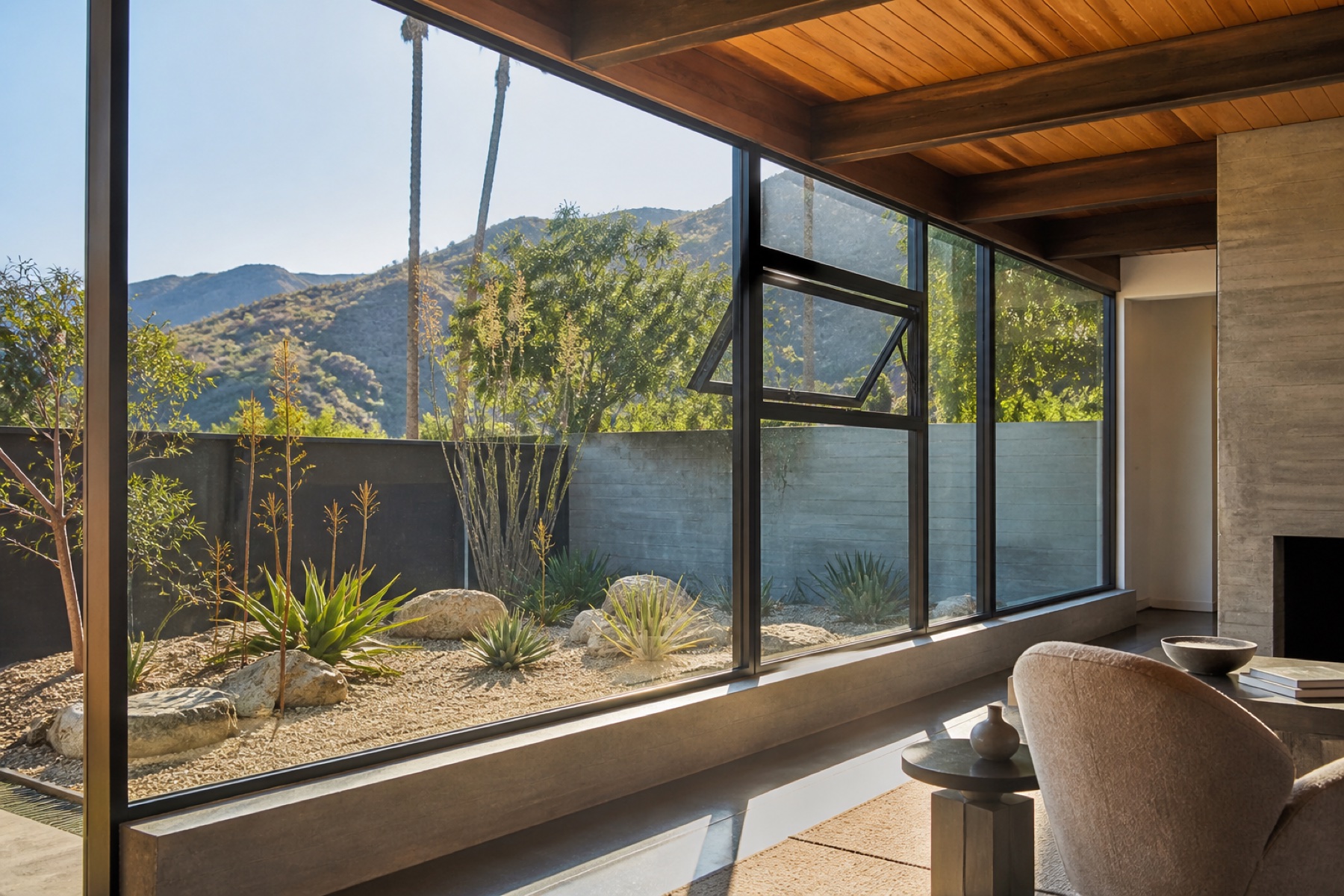 Slim dark aluminum windows in a Los Angeles post-and-beam living room